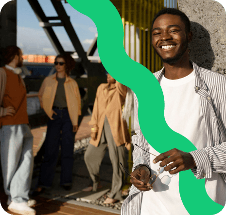 Person waving near the sea
